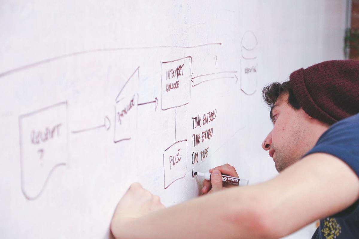 Man designing database 