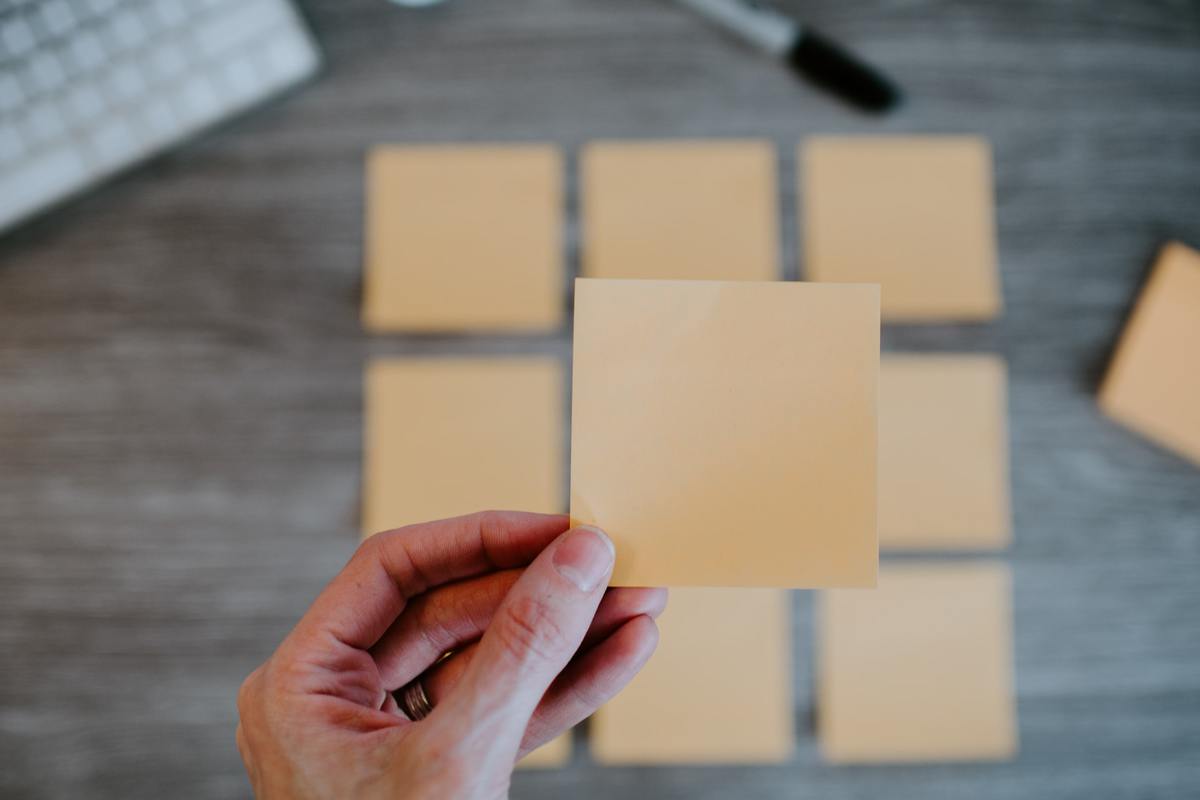 Person holding sticky note