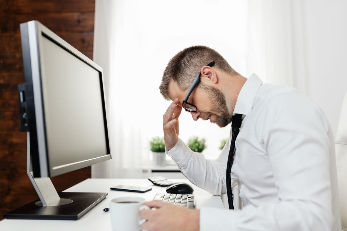 Man stressed at work