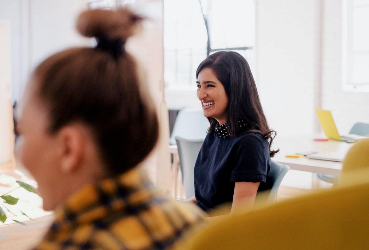 Woman smiling in meeting