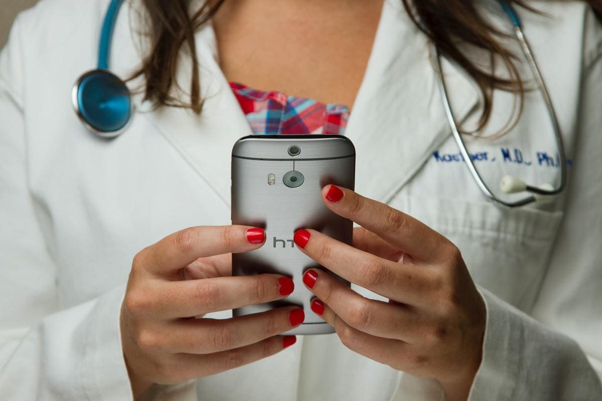 Doctor using phone