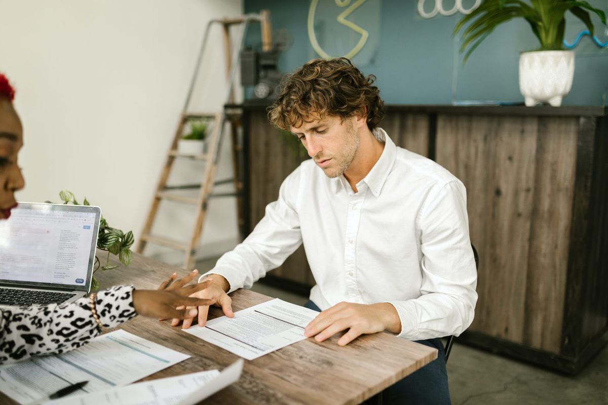 man reading a document