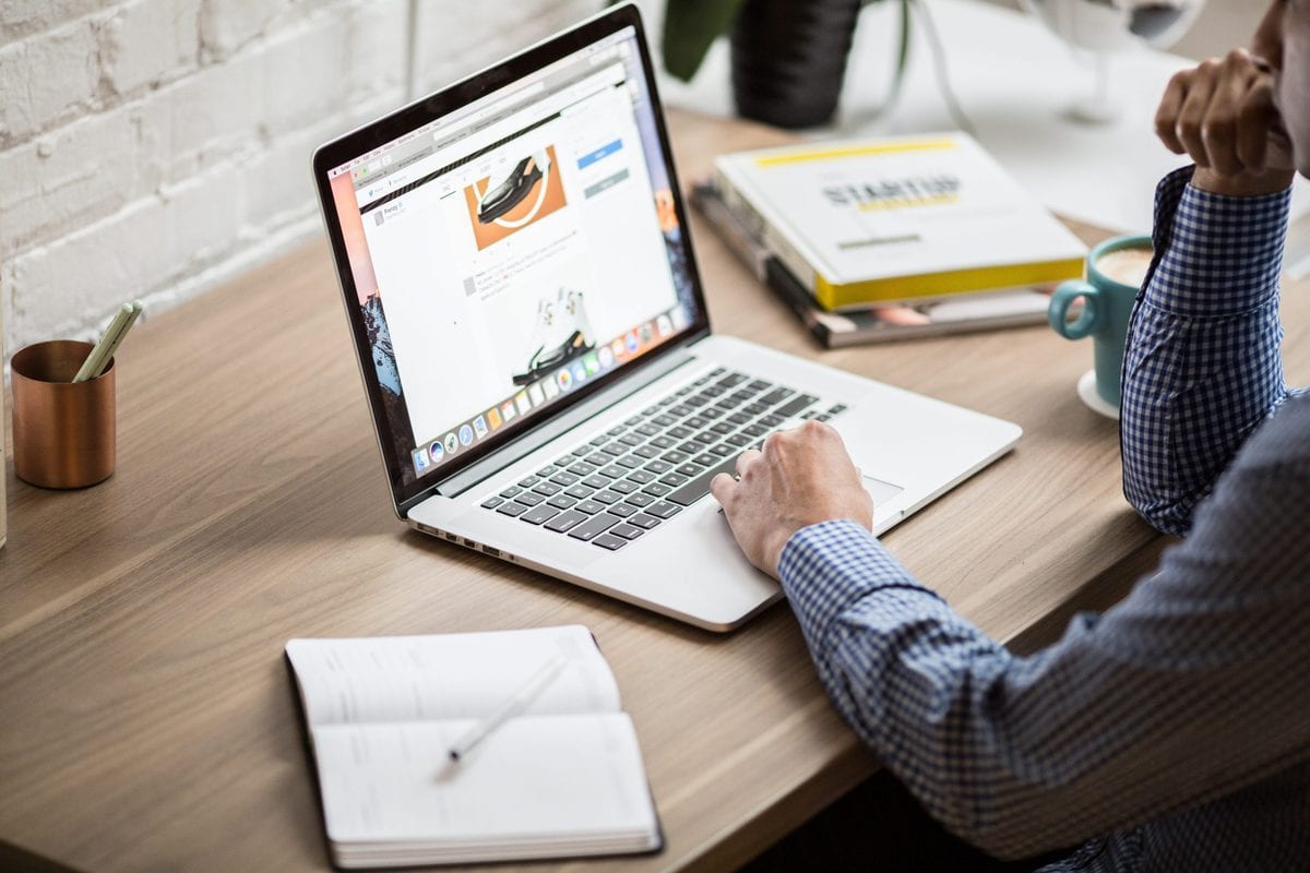 guy looking at the products on website