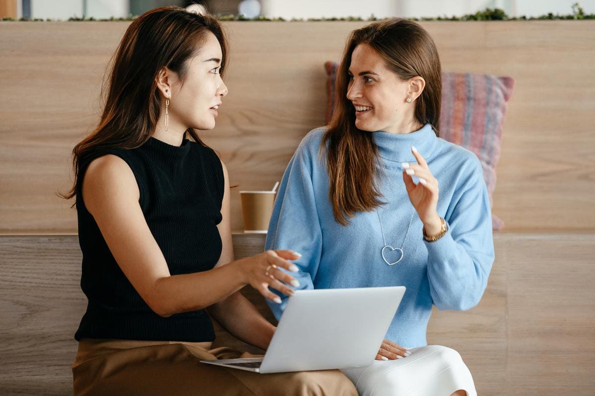 two girls working together