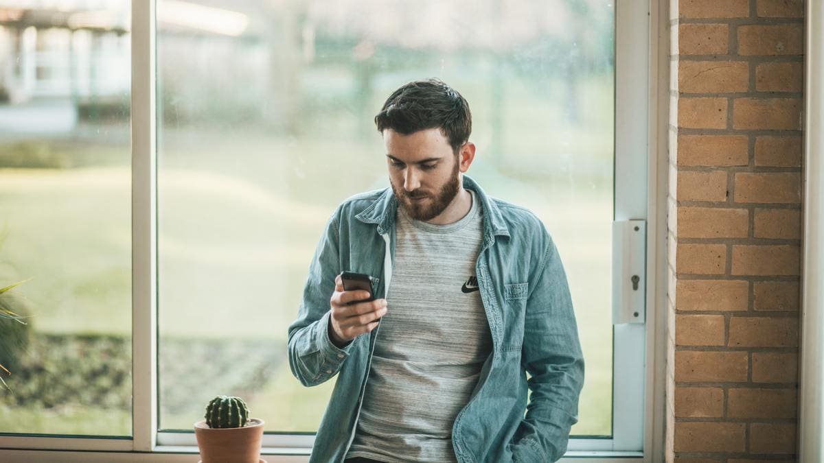 man using smartphone