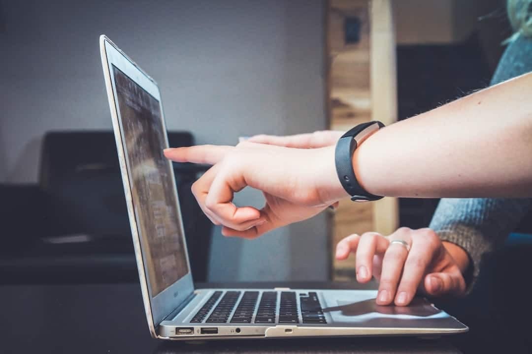 person-using-laptop-real-estate